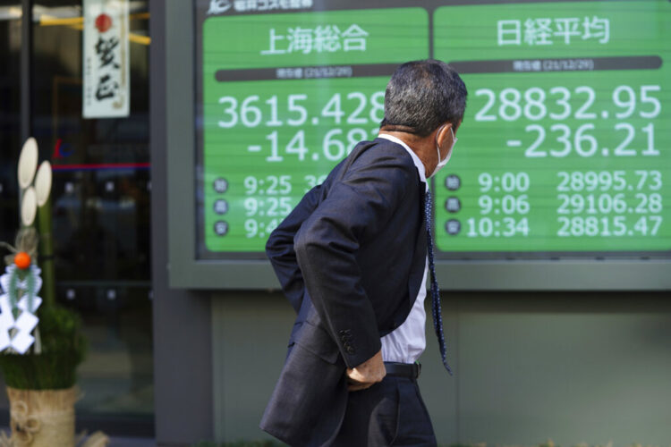 Wed. 9:18 a.m.: European shares mixed, Asia slips on omicron worries